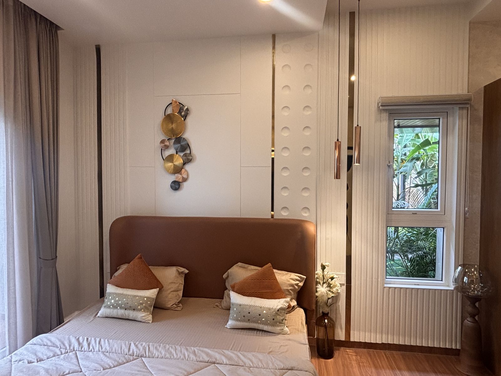 Bedroom with brown leather headboard, Wood & Co. Interiors