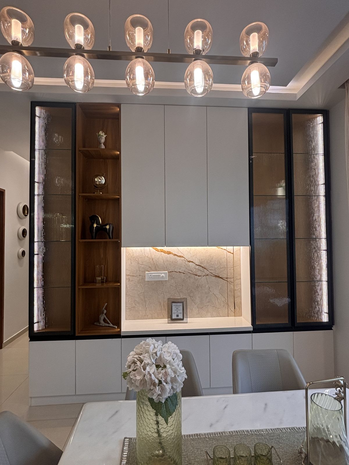 Dining feature wall with backlit marble, Wood & Co. Interiors